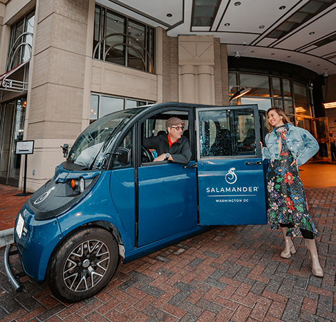 woman getting into a gem car