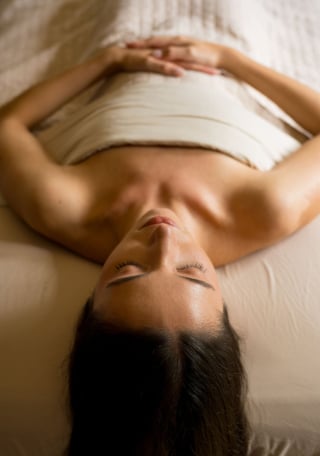 Woman laying on a spa bed